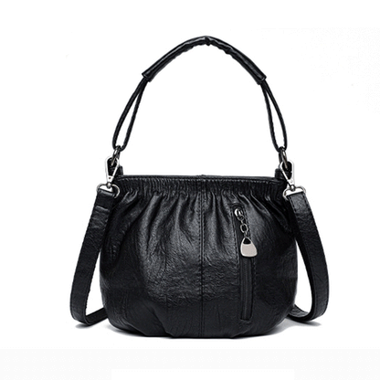 Bolso de mano con diseño arrugado