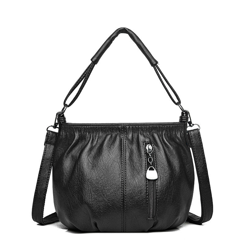 Bolso de mano con diseño arrugado