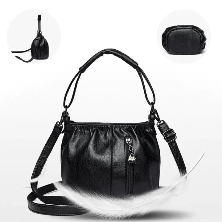 Bolso de mano con diseño arrugado