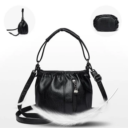 Bolso de mano con diseño arrugado